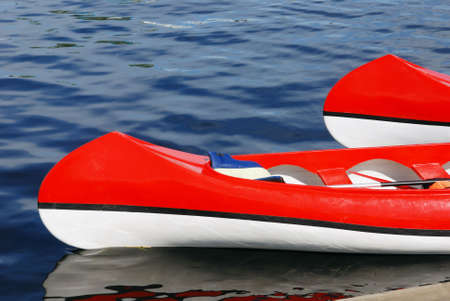 two rowing boats on water, red and white                                    の写真素材