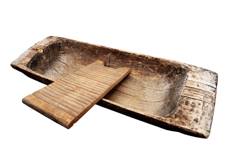 old wooden trough and washboard on a white backgroundの写真素材