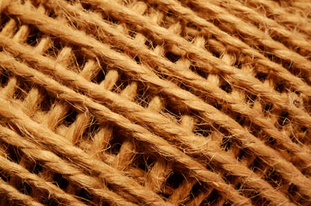 skein of coarse brown thread, closeup, horizontal