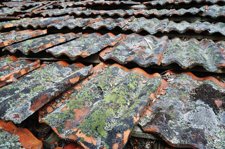 backround made from old terracota roof tilesの写真素材