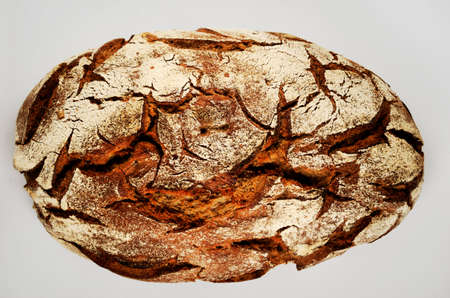 a loaf of rye bread over white