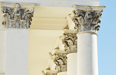 architecture, classical columns against blue sky, horizontal
