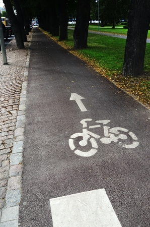 bike path sign and arrow on the pavement