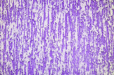 colored plaster relief on the wall close-up in sunny dayの写真素材