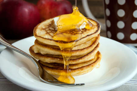 pancakes with butter and honeyの写真素材