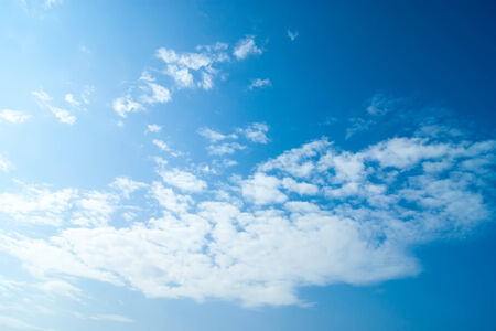 Blue sky with cloudsの写真素材