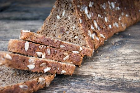 fresh bread and wheat on the wooden