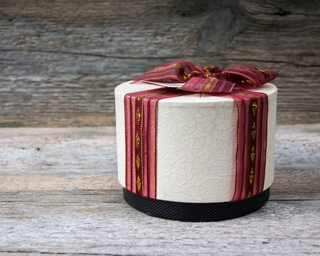 Gift box on a wooden backgroundの写真素材