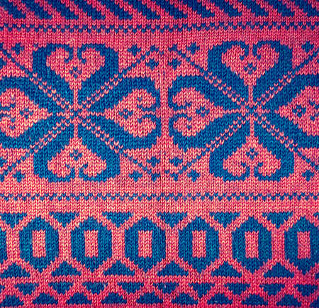 Knitted woolen background, red textureの写真素材