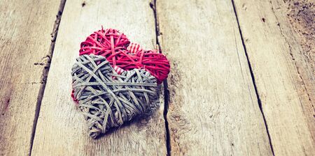 red heart on a wooden backgroundの写真素材