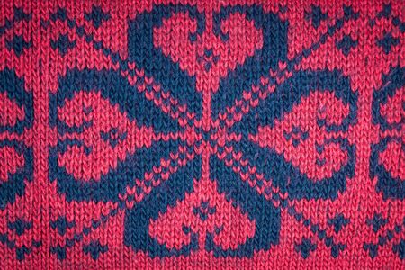 Knitted woolen background, red textureの写真素材