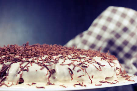 white cake decorated with chocolateの写真素材
