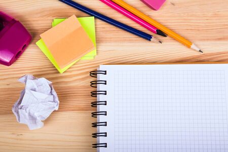 School supplies on wooden background