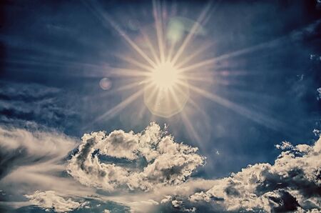 Blue sky, clouds and sun light background