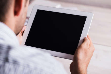 Tablet in male hands