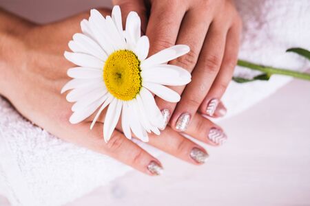 Manicure - Beauty treatment photo of nice manicured woman fingernails.の写真素材