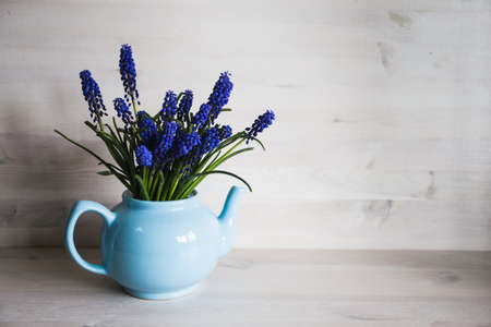 Blue flowers in a vase. Vintageの写真素材