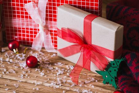 Christmas gift boxes on a wooden background