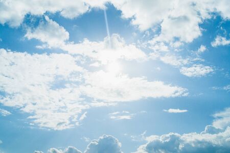 Beautiful blue sky with clouds and sun