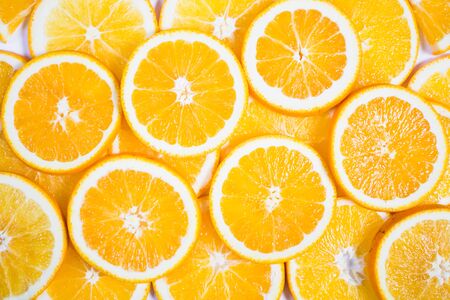 Sliced orange background. Food and drink