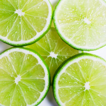 Lime slices background. Citrus