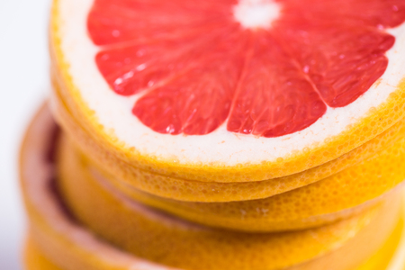 Texture of a ripe grapefruit slice, closeupの写真素材