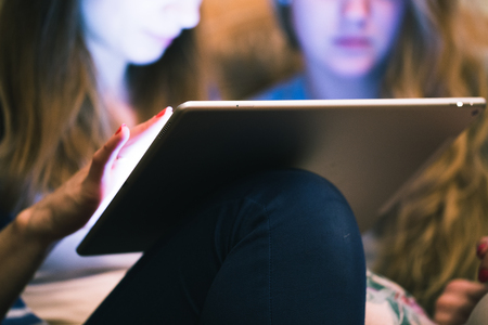 Close-up tablet computer in a woman handの写真素材