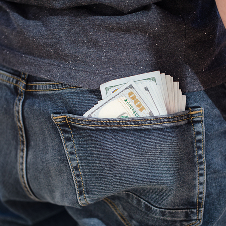 American dollars bank note in pocketの写真素材