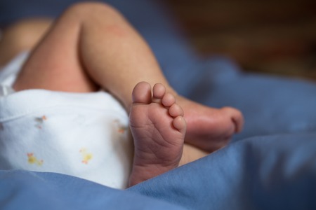 Little fingers. Legs newborn babyの写真素材