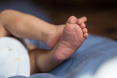Little fingers. Legs newborn babyの写真素材