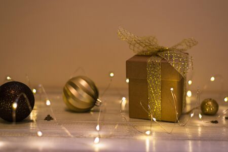 Christmas decoration with fir tree, gift box, garland lights, toys. Winter holidays, Merry Christmas, Happy New Year conceptの写真素材