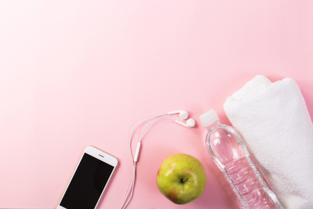 Running shoes, phone with fitness accessoriesの写真素材