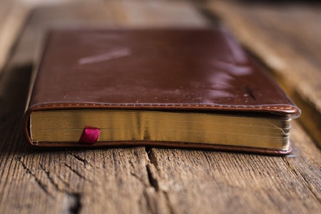 Notebook on wooden background