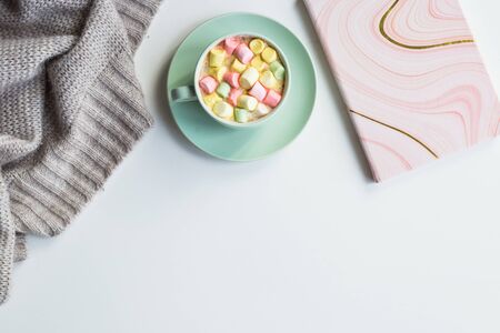 Cup of hot cocoa with marchmallows on white backgroundの写真素材