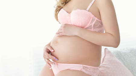 pregnant woman Hands hold Bellyの写真素材