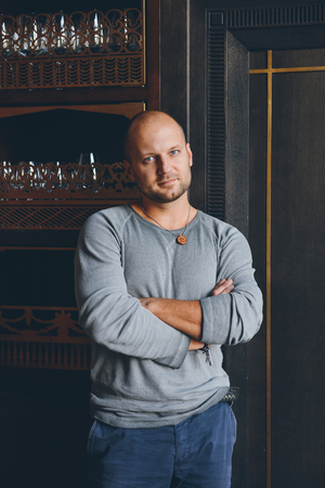 Portrait handsome man looking at the camera. Indoorsの写真素材