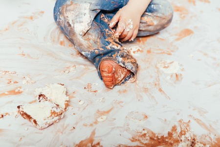 foot of a child. birthday. smash the cakeの写真素材