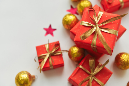 christmas composition, spruce branches to gifts in red boxes, christmas decorの写真素材