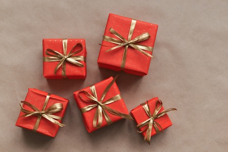 christmas composition, spruce branches to gifts in red boxes, christmas decorの写真素材