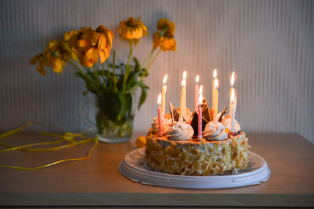 birthday cake with candles on the table. duskの写真素材