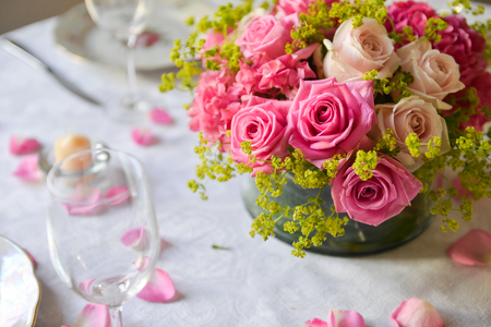 floral arrangement for interior decoration, table setting for a wedding or to create a home cosiness. use as backgroundの写真素材