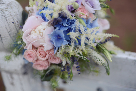Delicate wedding bridal bouquet, floral arrangement of flowers celebrate holiday decorの写真素材
