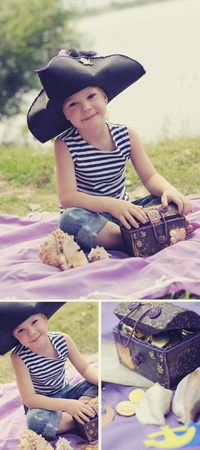 collage childrens stylized birthday outdoors in the style of pirates decor for kids. boys brothers in sea pirates costumes. candy bar decorations for a photo shootの写真素材