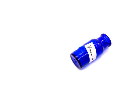 vaccine vintage blue bottle isolated on white background. Top view of vintage bottle.の写真素材