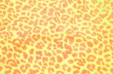 Crumpled wrapping paper yellow background. Leopard pattern.の写真素材