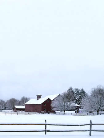 farm house with big sky over it. Wintry landscape, Copy spaceの写真素材