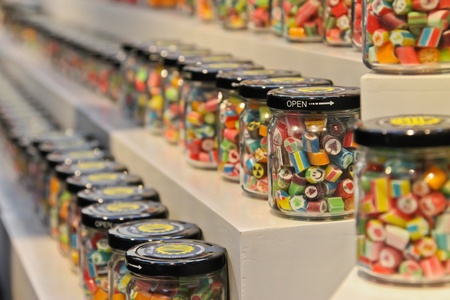 colorful candies in small jarsのeditorial素材