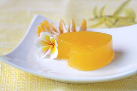 yellow jelly heart dessertの写真素材