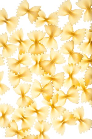Raw pasta on white background