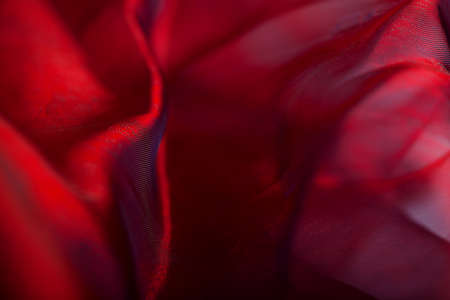 Abstract dark red fabric backgroundの写真素材